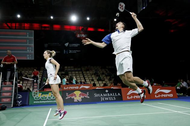England's fourth seeded mixed double Chris Adcock, right, and Gabrielle Adcock return a shot to Maylaysia's Tan Aik Quan and Lei Pei Jing, not seen, during their match at the World Badminton Championships at Ballerup Arena, Denmark, Tuesday, Aug. 26, 2014. (AP Photo/Jens Dresling, POLFOTO) DENMARK OUT