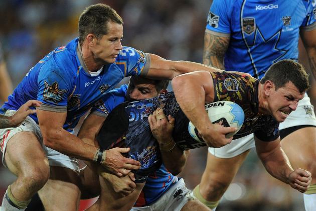 BRISBANE, AUSTRALIA - FEBRUARY 09:  Greg Bird of the Indigenous All Stars is tackled during the NRL All Stars Game between the Indigenous All Stars and the NRL All Stars at Suncorp Stadium on February 9, 2013 in Brisbane, Australia.  (Photo by Matt Roberts/Getty Images)