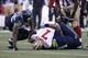 San Francisco 49ers quarterback Colin Kaepernick (7) is sacked against the Seattle Seahawks in the first half of an NFL football game, Sunday, Dec. 14, 2014, in Seattle. (AP Photo/Elaine Thompson)
