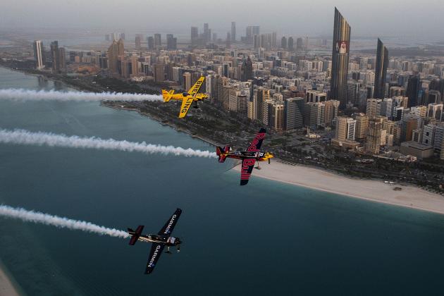 ABU DHABI, UAE - FEBRUARY 10:  In this handout from Red Bull, American Kirby Chambliss, Pete McLeod of Canada and Francois Le Vot of France fly during an aerial inspection of the nearby race track in preparation for the first stop of the 2015 Red Bull Air Race World Championship, February 10, 2015 in Abu Dhabi, the Untied Arab Emirates. The Championship takes place this weekend. (Photo by Joerg Mitter/Red Bull via Getty Images)
