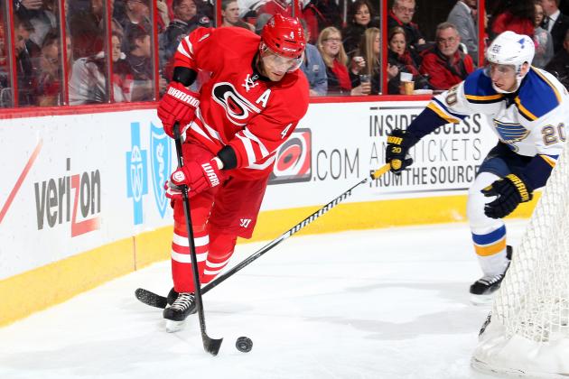 RALEIGH, NC - JANUARY 30: Alexander Steen #20 of the St. Louis Blues pursues Andrej Sekera #4 of the Carolina Hurricanes as he carries the puck around the back of the net during their NHL game at PNC Arena on January 30, 2015 in Raleigh, North Carolina. (Photo by Gregg Forwerck/NHLI via Getty Images)