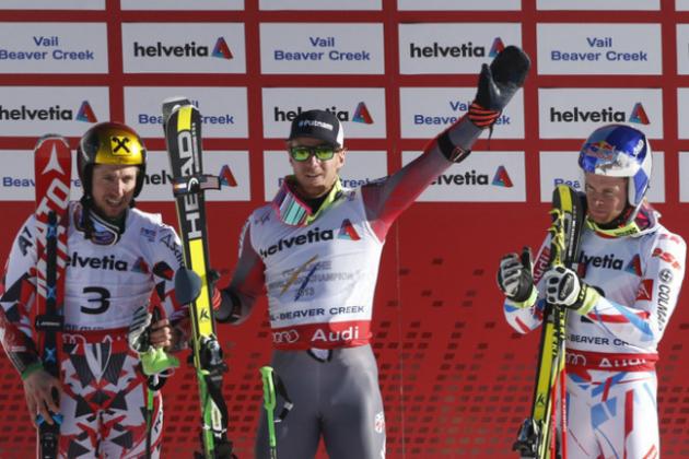 Winner United States' Ted Ligety, center, celebrates with Austria's Marcel Hirscher, left, second place, and France's Alexis Pinturault, right, third place, after the men's giant slalom competition at the alpine skiing world championships Friday, Feb. 13, 2015, in Beaver Creek, Colo. (AP Photo/Brennan Linsley)