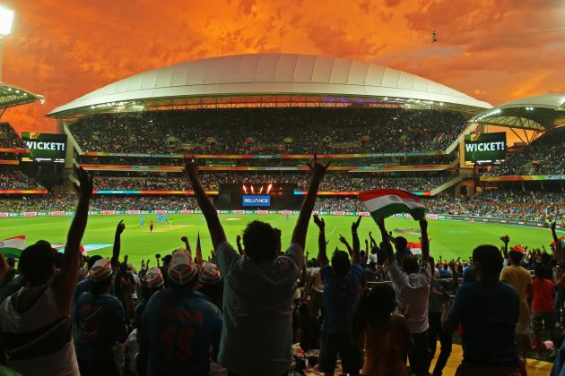 ADELAIDE, AUSTRALIA - FEBRUARY 15:  A general view as Indian fans in the crowd celebrate as a Pakistan wicket falls during the 2015 ICC Cricket World Cup match between India and Pakistan at Adelaide Oval on February 15, 2015 in Adelaide, Australia.  (Photo by Scott Barbour/Getty Images)
