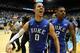 CHAPEL HILL, NC - FEBRUARY 08: Austin Rivers #0 of the Duke Blue Devils celebrates with teammate Quinn Cook #2 after hitting a game-winning 3 pointer to defeat the North Carolina Tar Heels 85-84 during their game at the Dean Smith Center on February 8, 2012 in Chapel Hill, North Carolina. (Photo by Streeter Lecka/Getty Images)