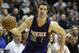 Phoenix Suns guard Goran Dragic (1) drives during the first half of an NBA basketball game against the Dallas Mavericks Friday, Dec. 5, 2014, in Dallas. (AP Photo/LM Otero)