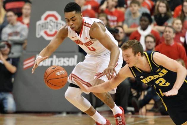 COLUMBUS, OH - JANUARY 13: D'Angelo Russell #0 of the Ohio State Buckeyes and Spike Albrecht #2 of the Michigan Wolverines battle for control of a loose ball in the second half on January 13, 2015 at Value City Arena in Columbus, Ohio. Ohio State defeated Michigan 71-52. (Photo by Jamie Sabau/Getty Images)