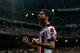 MADRID, SPAIN - AUGUST 19: Raul Garcia of Atletico de Madrid celebrates scoring their opening goal during the Supercopa first leg match between Real Madrid and Club Atletico de Madrid at Estadio Santiago Bernabeu on August 19, 2014 in Madrid, Spain. (Photo by Gonzalo Arroyo Moreno/Getty Images)