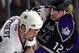 Chicago Blackhawks' Bob Probert (24) and Los Angeles Kings' Ken Belanger (12) mix it up in the third period Tuesday, Oct. 30, 2001, in Chicago. Both players got 5-minute penalties for fighting. The Blackhawks won 5-1. (AP Photo/Fred Jewell)