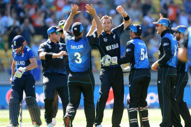 New Zealand bowler Tim Southee, centre, is congratulated by teammates after dismissing England's James Taylor, left, for no score during their Cricket World Cup match in Wellington, New Zealand, Friday Feb. 20, 2015. (AP Photo/Ross Setford)