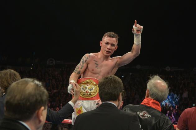 BELFAST, NORTHERN IRELAND - SEPTEMBER 6: The new IBF super-bantamweight world champion Carl Frampton of Northern Ireland celebrates after his victory over Kiko Martinez of Spain, at the purpose-built 16,000 capacity Titanic slipway outdoor arena on September 6, 2014 in Belfast, Northern Ireland. (Photo by Charles McQuillan/Getty Images).