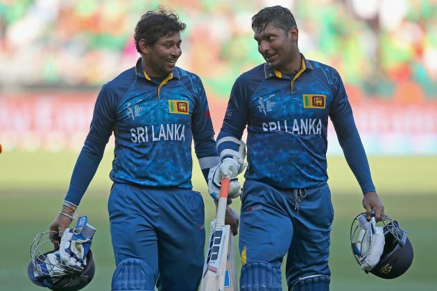 MELBOURNE, AUSTRALIA - FEBRUARY 26:  Tillakaratne Dilshan and Kumar Sangakkara of Sri Lanka walk off the field during the 2015 ICC Cricket World Cup match between Sri Lanka and Bangladesh at Melbourne Cricket Ground on February 26, 2015 in Melbourne, Australia.  (Photo by Quinn Rooney/Getty Images)