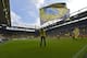 Fans wave flags prior the German Bundesliga soccer match between Borussia Dortmund and Bayer Leverkusen at the Signal-Iduna Park in Dortmund, Germany, Saturday, Aug. 23, 2014, 2014. (AP Photo/Martin Meissner)