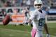 Miami Dolphins wide receiver Brian Hartline (82) warms up before an NFL football game against the Chicago Bears Sunday, Oct. 19, 2014 in Chicago. (AP Photo/Charles Rex Arbogast)
