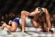 LOS ANGELES, CA - FEBRUARY 28: (Top) Ronda Rousey grapples with Cat Zingano in their UFC women's bantamweight championship bout during the UFC 184 event at Staples Center on February 28, 2015 in Los Angeles, California. (Photo by Harry How/Getty Images)