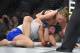 Ronda Rousey, right, grapples with Cat Zingano during a UFC 184 mixed martial arts bantamweight title bout, Saturday, Feb. 28, 2015, in Los Angeles. Rousey won after Zingano tapped out 14 seconds into the bout. (AP Photo/Mark J. Terrill)