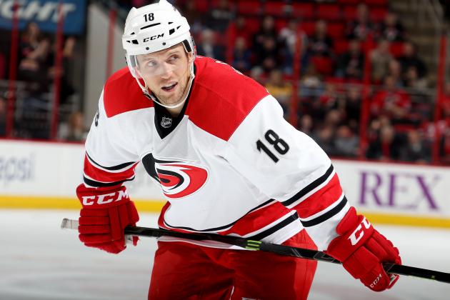 RALEIGH, NC - DECEMBER 02: Jay McClement #18 of the Carolina Hurricanes prepares for a faceoff during their NHL game against the Nashville Predators at PNC Arena on December 2, 2014 in Raleigh, North Carolina. (Photo by Gregg Forwerck/NHLI via Getty Images)