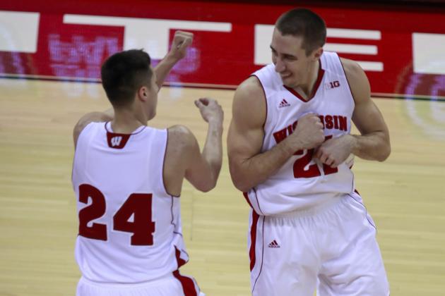 Wisconsin guard Bronson Koenig, left, and guard Josh Gasser celebrate during the first half of an NCAA college basketball game against Iowa Tuesday, Jan. 20, 2015, in Madison, Wis. (AP Photo/Andy Manis)