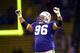 FILE- In this Dec. 16, 2000, file photo, Seattle Seahawks defensive tackle Cortez Kennedy (96) celebrates Seattle's 27-24 victory over the Oakland Raiders in an NFL football game in Seattle. Kennedy was elected to the Pro Football Hall of Fame on Saturday, Feb. 4, 2012. (AP Photo/Cheryl Hatch, File)