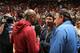 MIAMI, FL - JANUARY 27: Boxers, Manny Pacquiao and Floyd Mayweather Jr talk before the game between the Milwaukee Bucks and Miami Heat on January 27, 2015 at American Airlines Arena in Miami, Florida. NOTE TO USER: User expressly acknowledges and agrees that, by downloading and or using this Photograph, user is consenting to the terms and conditions of the Getty Images License Agreement. Mandatory Copyright Notice: Copyright 2015 NBAE (Photo by Issac Baldizon/NBAE via Getty Images)