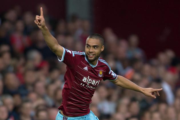 West Ham United’s Winston Reid celebrates scoring his team's first goal during their English Premier League soccer match against Liverpool at Upton Park, London, Saturday, Sept. 20, 2014. (AP Photo/Tim Ireland)
