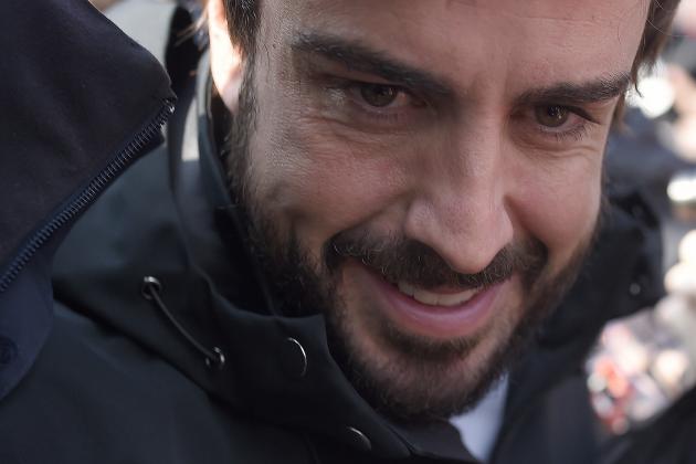 Fernando Alonso of Spain and McLaren Honda smiles during the 2015 Formula One testing at the Barcelona Catalunya racetrack in Montmelo, Spain, Friday, Feb. 20, 2015. (AP Photo/Manu Fernandez)