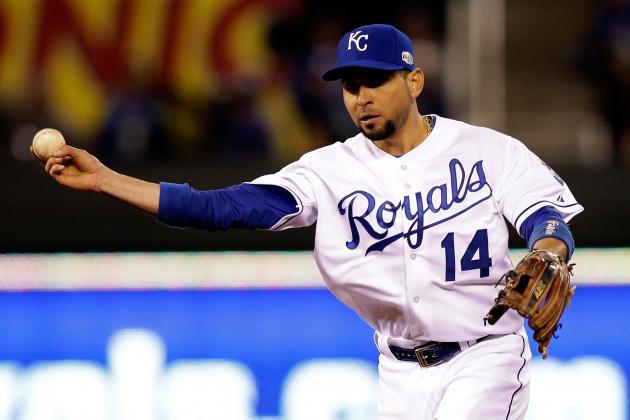 KANSAS CITY, MO - OCTOBER 28:  Omar Infante #14 of the Kansas City Royals throws to first base against the San Francisco Giants during Game Six of the 2014 World Series at Kauffman Stadium on October 28, 2014 in Kansas City, Missouri.  (Photo by Ezra Shaw/Getty Images)