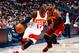 ATLANTA, GA - MARCH 06: Dennis Schroder #17 of the Atlanta Hawks drives against Kyrie Irving #2 of the Cleveland Cavaliers at Philips Arena on March 6, 2015 in Atlanta, Georgia. NOTE TO USER: User expressly acknowledges and agrees that, by downloading and/or using this photograph, user is consenting to the terms and conditions of the Getty Images License Agreement. (Photo by Kevin C. Cox/Getty Images)