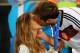 RIO DE JANEIRO, BRAZIL - JULY 13: Mario Goetze of Germany kisses girlfriend Ann-Kathrin Brommel after defeating Argentina 1-0 in extra time during the 2014 FIFA World Cup Brazil Final match between Germany and Argentina at Maracana on July 13, 2014 in Rio de Janeiro, Brazil. (Photo by Martin Rose/Getty Images)