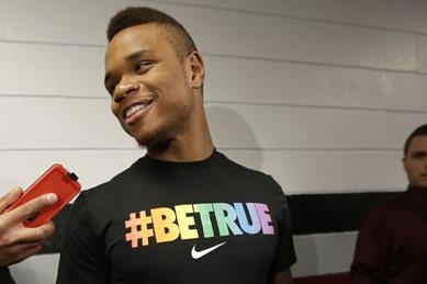 University of Massachusetts basketball guard Derrick Gordon, 22, faces reporters on the school's campus, Wednesday, April 9, 2014, in Amherst, Mass. Gordon has become the first openly gay player in Division I men's basketball. (AP Photo/Steven Senne)