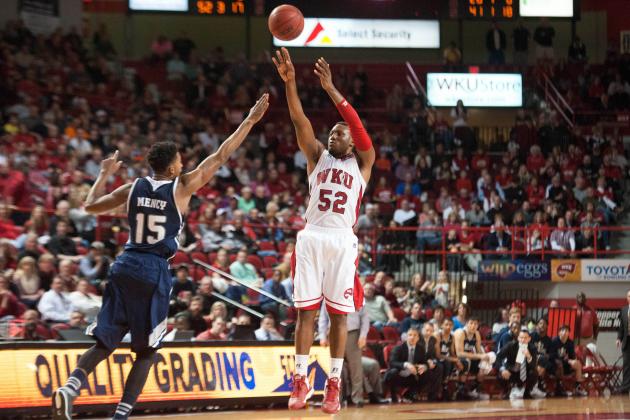 Feb 7, 2015; Bowling Green, KY, USA; Western Kentucky Hilltoppers guard T.J. Price (52) shoots the ball over Rice Owls guard Bishop Mency (15) during the second half at E.A. Diddle Arena. Mandatory Credit: Joshua Lindsey-USA TODAY Sports