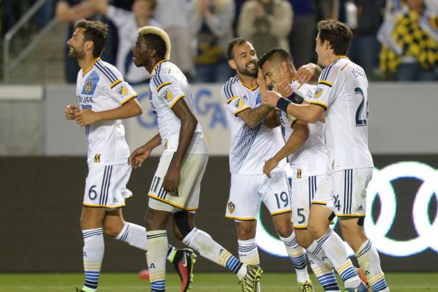Mar 6, 2015; Carson, CA, USA; Los Angeles Galaxy midfielder Jose Villarreal (5) celebrates with teammates after scoring a goal in the second half against the Chicago Fire at StubHub Center. The Galaxy won 2-0.  Mandatory Credit: Kirby Lee-USA TODAY Sports