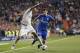 Real Madrid's Pepe, left, passes Schalke's Matija Nastasic, right, during a Champions League soccer match round of 16 second leg, between Real Madrid and Schalke 04 at Santiago Bernabeu stadium, in Madrid, Spain, Tuesday, March 10, 2015. (AP Photo/Daniel Ochoa de Olza)