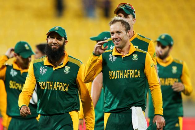 WELLINGTON, NEW ZEALAND - MARCH 12: Hashim Amla (L) and AB de Villiers of South Africa are all smiles after winning the 2015 ICC Cricket World Cup match between South Africa and the United Arab Emirates at Wellington Regional Stadium on March 12, 2015 in Wellington, New Zealand. (Photo by Hagen Hopkins/Getty Images)