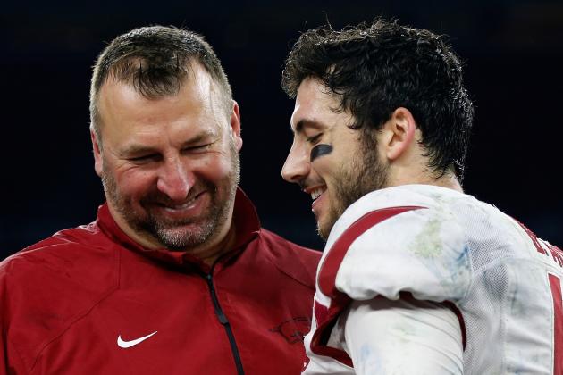 HOUSTON, TX - DECEMBER 29:  Head coach Bret Bielema of the Arkansas Razorbacks celebrates with his MVP quarterback Brandon Allen #10  after the Arkansas Razorbacks defeated the Texas Longhorns 31-7 at the AdvoCare V100 Texas Bowl at NRG Stadium on December 29, 2014 in Houston, Texas.  (Photo by Scott Halleran/Getty Images)