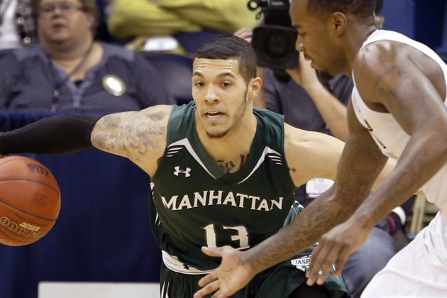 Manhattan's Emmy Andujar (13) brings the ball down court against Pittsburgh in the second half of an NCAA college basketball game on Wednesday, Dec. 17, 2014, in Pittsburgh. (AP Photo/Keith Srakocic)