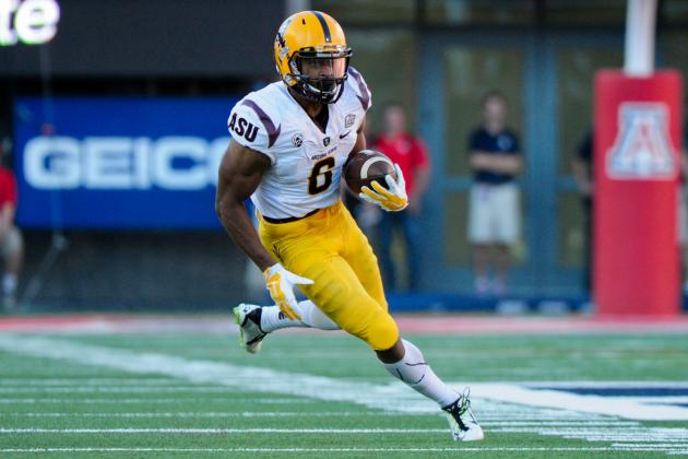 Nov 28, 2014; Tucson, AZ, USA; Arizona State Sun Devils wide receiver Cameron Smith (6) carries the ball after a catch during the second half against the Arizona Wildcats at Arizona Stadium. Mandatory Credit: Matt Kartozian-USA TODAY Sports