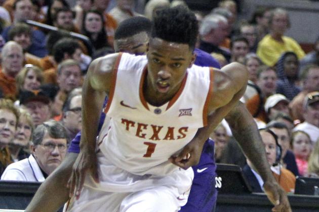 Texas guard Isaiah Taylor dribbles the ball during the second half of an NCAA college basketball game against Kansas State, Saturday, March 7, 2015, in Austin, Texas.  (AP Photo/Michael Thomas)