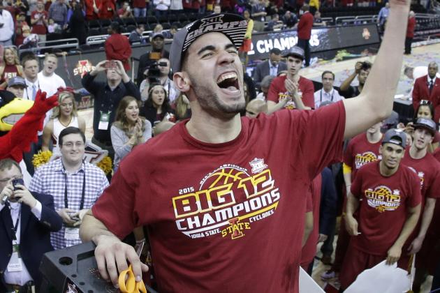 Iowa State's Georges Niang  cuts down the net after winning an NCAA college basketball game against Kansas in the finals of the Big 12 Conference tournament Saturday, March 14, 2015, in Kansas City, Mo. Iowa State won 70-66. (AP Photo/Charlie Riedel)