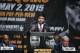 Boxer Manny Pacquiao, center, of the Philippines, speaks as he is joined by promoters, Bob Arum, right, and Leonard Ellerbe at a news conference, Wednesday, March 11, 2015, in Los Angeles. Pacquiao is scheduled to fight Floyd Mayweather Jr. in Las Vegas on May 2. (AP Photo/Jae C. Hong)