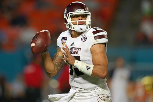 MIAMI GARDENS, FL - DECEMBER 31:  Dak Prescott #15 of the Mississippi State Bulldogs sets to throw during the second half of the Capital One Orange Bowl game against the Georgia Tech Yellow Jackets at Sun Life Stadium on December 31, 2014 in Miami Gardens, Florida.  (Photo by Mike Ehrmann/Getty Images)