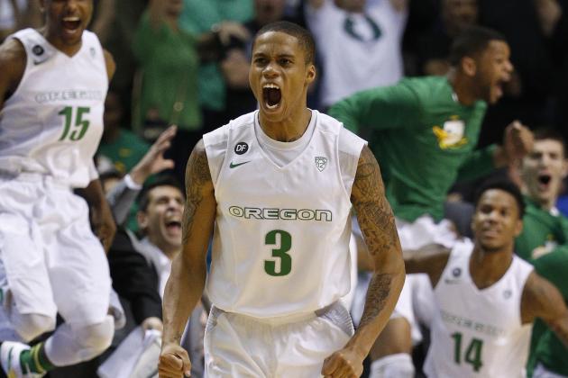 Oregon's Joseph Young celebrates after scoring a 3-point game winning shot against Utah in the final seconds of the second half of an NCAA college basketball game in the semifinals of the Pac-12 conference tournament Friday, March 13, 2015, in Las Vegas. (AP Photo/John Locher)