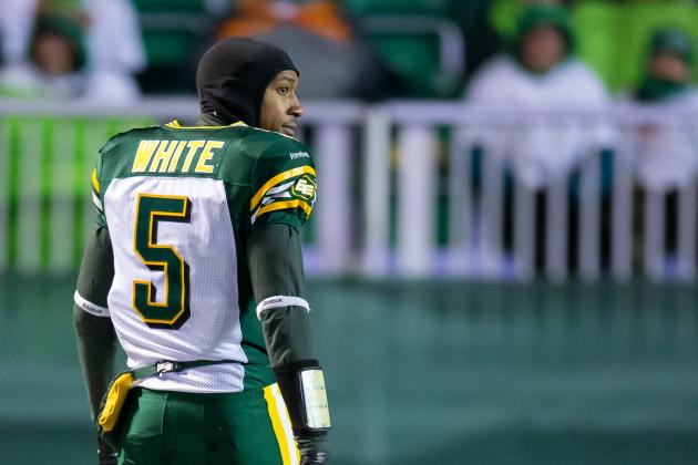 REGINA, SK - NOVEMBER 08: Pat White #5 of the Edmonton Eskimos leaves the game after taking a big hit to the head in the second half of  a game between the Edmonton Eskimos and Saskatchewan Roughriders in week 20 of the 2014 CFL season at Mosaic Stadium on November 08, 2014 in Regina, Saskatchewan, Canada.  (Photo by Brent Just/Getty Images)