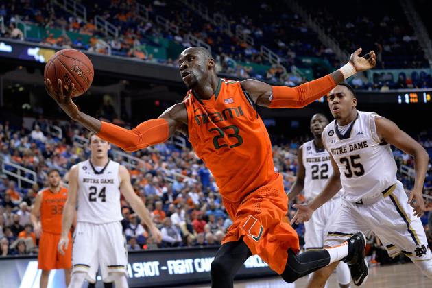 GREENSBORO, NC - MARCH 12:  Tonye Jekiri #23 of the Miami Hurricanes tracks down a loose ball on the end line against the Notre Dame Fighting Irish during the quarterfinals of the ACC Basketball Tournament at Greensboro Coliseum on March 12, 2015 in Greensboro, North Carolina.  (Photo by Grant Halverson/Getty Images)