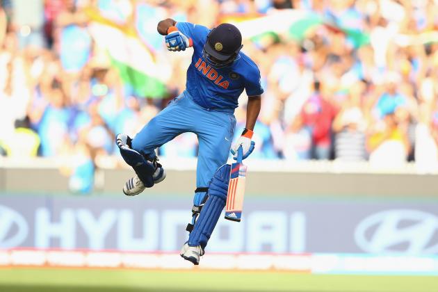 MELBOURNE, AUSTRALIA - MARCH 19:  Rohit Sharma of India celebrates after scoring his century during the 2015 ICC Cricket World Cup match between India and Bangldesh at Melbourne Cricket Ground on March 19, 2015 in Melbourne, Australia.  (Photo by Robert Cianflone/Getty Images)