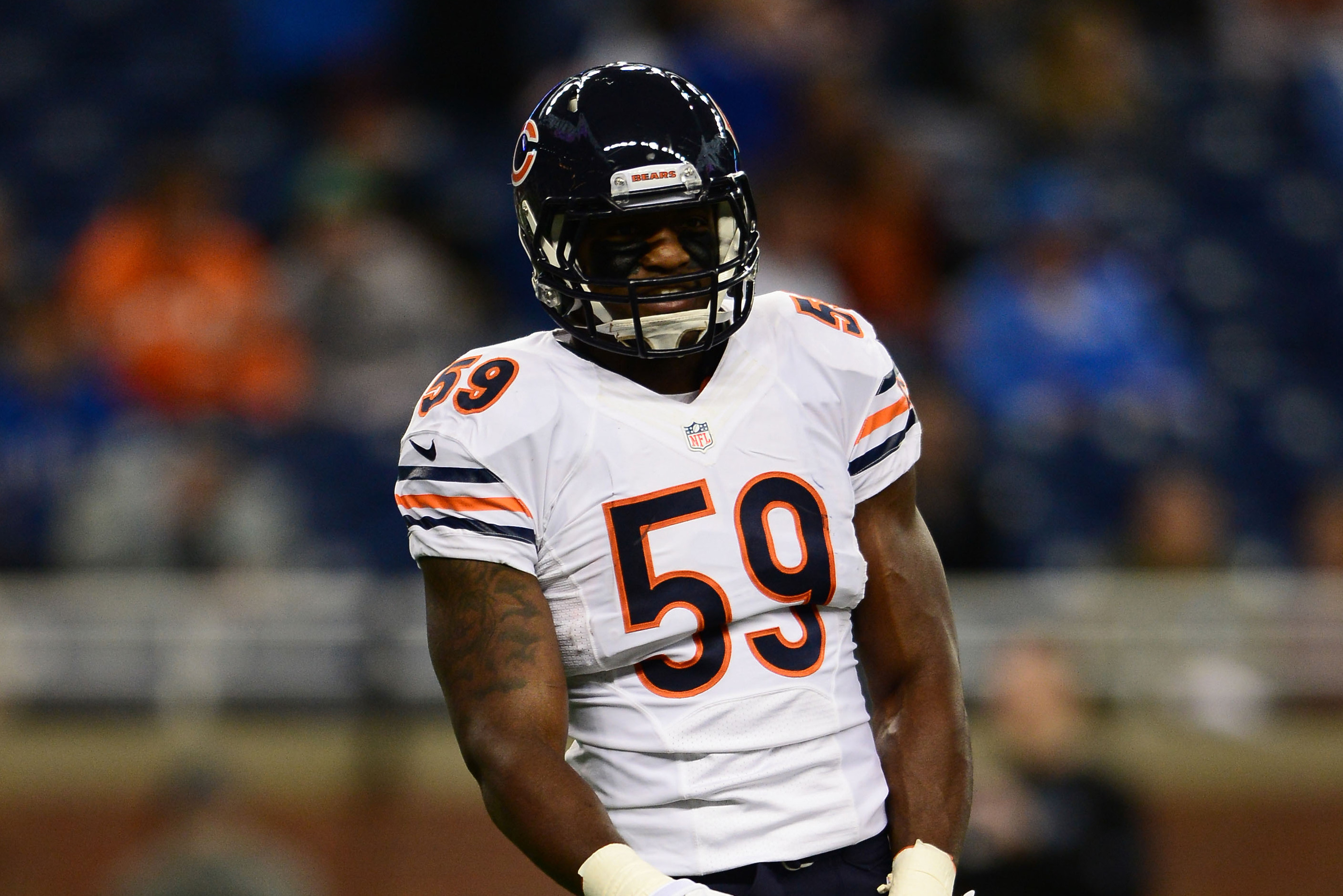 Chicago Bears outside linebacker Christian Jones (57) runs on the