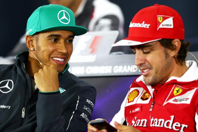 SHANGHAI, CHINA - APRIL 17:  (L-R) Lewis Hamilton of Great Britain and Mercedes GP speaks with Fernando Alonso of Spain and Ferrari during a press conference ahead of the Chinese Formula One Grand Prix at the Shanghai International Circuit on April 17, 2014 in Shanghai, China.  (Photo by Clive Mason/Getty Images)