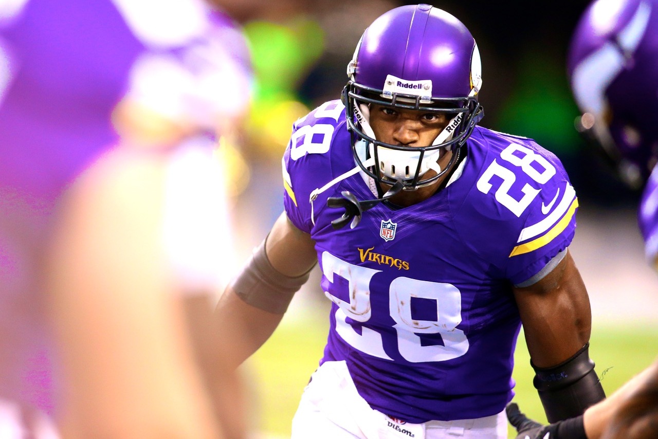 No surprise here: Adrian Peterson still in purple