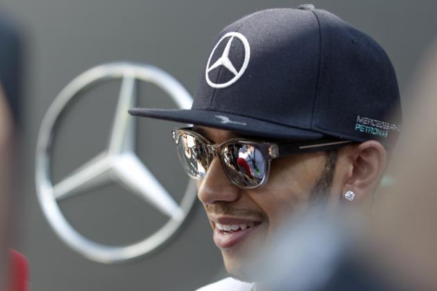 Mercedes driver Lewis Hamilton of Britain talks to the media at the paddock of Sepang International Circuit ahead of the Malaysian Formula One Grand Prix in Sepang, Malaysia, Thursday, March 26, 2015. (AP Photo/Joshua Paul)
