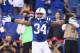 INDIANAPOLIS, IN - DECEMBER 15: Trent Richardson #34 of the Indianapolis Colts celebrates after scoring a touchdown during the NFL game against the Houston Texans at Lucas Oil Stadium on December 15, 2013 in Indianapolis, Indiana. (Photo by Andy Lyons/Getty Images)