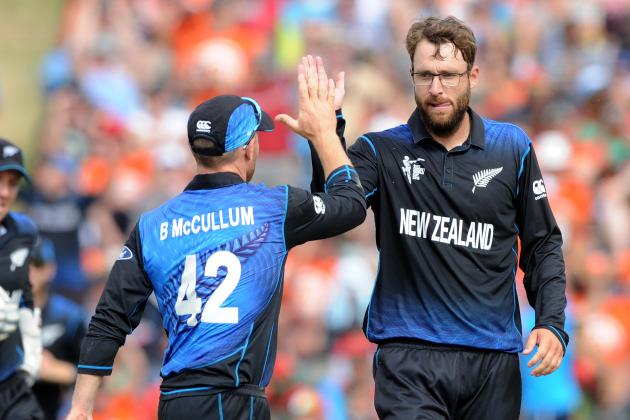 FILE PHOTO - In this Friday March 13, 2015 file photo New Zealand’s Dan Vettori, right, is congratulated by his captain Brendon McCullum after taking the wicket of Bangladesh's Sarkar Soumya during their Cricket World Cup Pool A match in Hamilton, New Zealand. Vettori has classified New Zealand's preparation for it's World Cup quarterfinal against the West Indies on Saturday March 21, 1015. as casual, yet professional.  (AP Photo/Ross Setford,File)